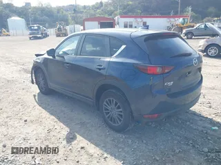 2019 Mazda CX-5 Touring with VIN JM3KFBCM8K0518806, listed as a IAAI auction lot 42038168 with 61,449 mi miles and . Bid and sale history available at DreamBid. Image 3.