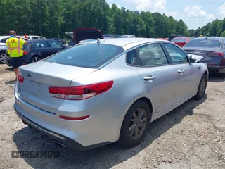 2019 Kia Optima LX with VIN 5XXGT4L3XKG345802, listed as a IAAI auction lot 42609317 with 74,664 mi miles and . Bid and sale history available at DreamBid. Image 4.
