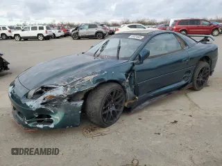 1995 Mitsubishi 3000GT z VIN JA3AM54J7SY004218, wystawiony jako Copart lot #44024685 z przebiegiem 142 935 mil mil oraz Szkody całkowita. Historia ofert i sprzedaży dostępna na DreamBid. Obrazek 1.