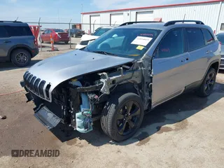 2016 Jeep Cherokee Latitude with VIN 1C4PJLCB2GW185637, listed as a IAAI auction lot 41894019 with 87,888 mi miles and . Bid and sale history available at DreamBid. Image 2.