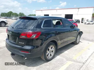 2014 Mazda CX-9 Touring with VIN JM3TB2CA5E0429835, listed as a IAAI auction lot 42439258 with 110,914 mi miles and . Bid and sale history available at DreamBid. Image 4.