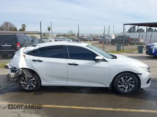 2016 Honda Civic EX with VIN 19XFC2F72GE097060, listed as a IAAI auction lot 41626940 with 156,941 mi miles and . Bid and sale history available at DreamBid. Image 14.