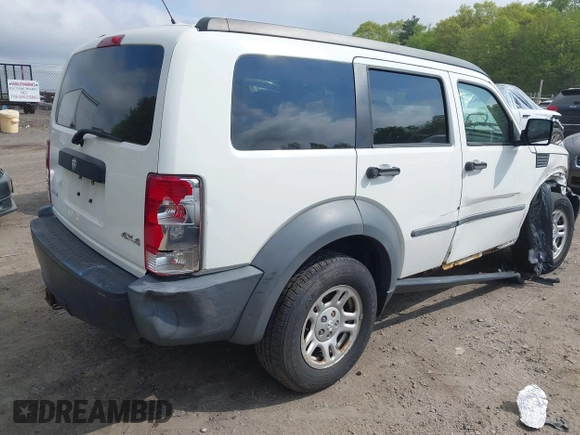2007 Dodge Nitro SXT z VIN 1D8GU28K87W652037, wystawiony jako IAAI lot #42172950 z przebiegiem 172 487 mil mil oraz . Historia ofert i sprzedaży dostępna na DreamBid. Obrazek 4.