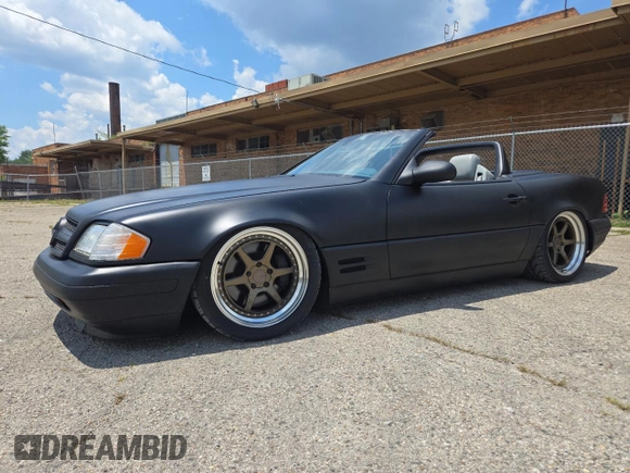 1999 Mercedes-Benz SL 500 with VIN WDBFA68FXXF184548, listed as a Copart auction lot 63814775 with 133,681 mi miles and Clean title. Bid and sale history available at DreamBid. Image 2.