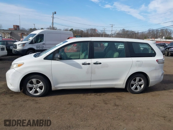 2011 Toyota Sienna with VIN 5TDZK3DC3BS058823, listed as a IAAI auction lot 41654859 with 227,969 mi miles. Bid and sale history available at carsss.com. Image 14.