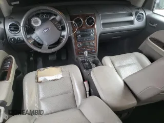 2009 Ford Taurus X Limited with VIN 1FMDK03W89GA01358, listed as a Copart auction lot 79132254 with 173,623 mi miles and Salvage title. Bid and sale history available at DreamBid. Image 8.