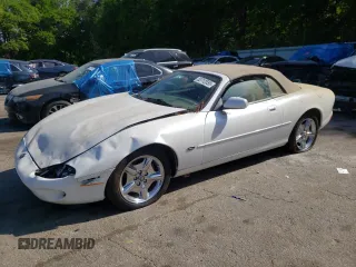 1999 Jaguar XK with VIN SAJGX2043XC040866, listed as a Copart auction lot 53712555 with 65,349 mi miles and Clean Title. Bid and sale history available at DreamBid. Image 1.
