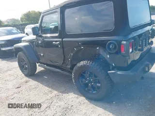 2021 Jeep Wrangler Sport z VIN 1C4GJXAN7MW796019, wystawiony jako IAAI lot #42172407 z przebiegiem 34 128 mil mil oraz . Historia ofert i sprzedaży dostępna na DreamBid. Obrazek 6.