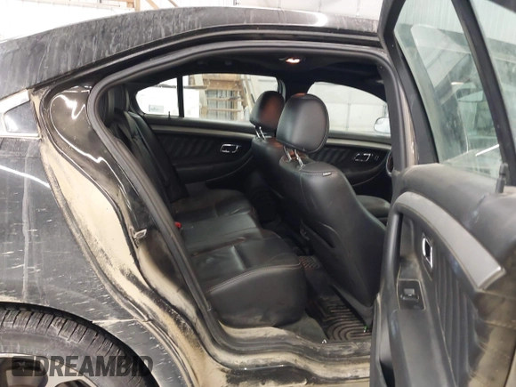 2014 Ford Taurus SEL with VIN 1FAHP2E87EG117653, listed as a IAAI auction lot 41589415 with 125,040 mi miles. Bid and sale history available at carsss.com. Image 8.