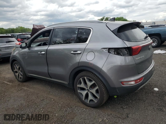 2017 Kia Sportage SX Turbo with VIN KNDPR3A65H7243783, listed as a Copart auction lot 57088825 with 129,937 mi miles and Salvage title. Bid and sale history available at DreamBid. Image 2.