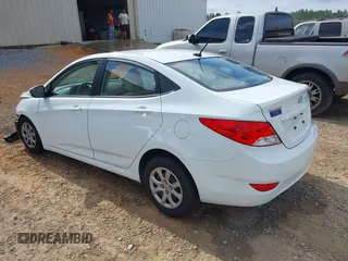 2014 Hyundai Accent GLS z VIN KMHCT4AE5EU697201, wystawiony jako IAAI lot #42157098 z przebiegiem 139 181 mil mil oraz . Historia ofert i sprzedaży dostępna na DreamBid. Obrazek 3.