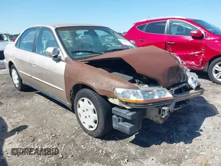 2000 Honda Accord LX z VIN 1HGCG5645YA148992, wystawiony jako IAAI lot #41998635 z przebiegiem 302 093 mil mil oraz . Historia ofert i sprzedaży dostępna na DreamBid. Obrazek 1.