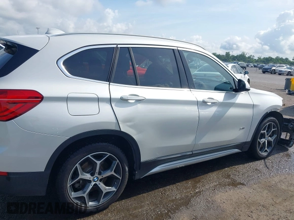 2018 BMW X1 sDrive28i z VIN WBXHU7C34J5H40814, wystawiony jako IAAI lot #42291108 z przebiegiem 93 200 mil mil oraz . Historia ofert i sprzedaży dostępna na DreamBid. Obrazek 13.