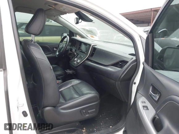 2018 Toyota Sienna SE with VIN 5TDXZ3DC3JS910458, listed as a IAAI auction lot 40980174 with 133,139 mi miles and . Bid and sale history available at DreamBid. Image 5.