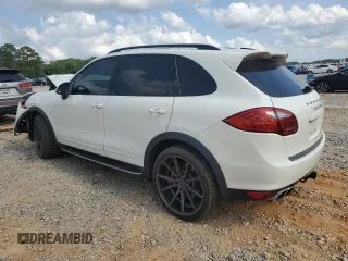 2012 Porsche Cayenne Turbo z VIN WP1AC2A2XCLA81906, wystawiony jako Copart lot #57356955 z przebiegiem 118 855 mil mil oraz Szkoda całkowita • Salvage title. Historia ofert i sprzedaży dostępna na DreamBid. Obrazek 2.