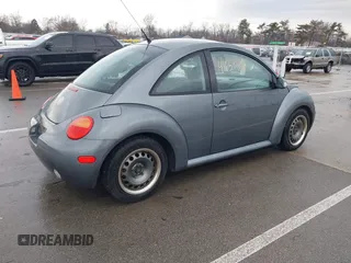 2004 Volkswagen New Beetle Coupe GL with VIN 3VWBK21C34M400724, listed as a IAAI auction lot 41658126 with 150,150 mi miles. Bid and sale history available at carsss.com. Image 4.