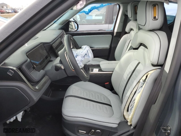 2025 Rivian R1T Adventure with VIN 7FCTGBAA6SN035587, listed as a Copart auction lot 49142625 with 0 mi miles and Salvage Title. Bid and sale history available at carsss.com. Image 7.