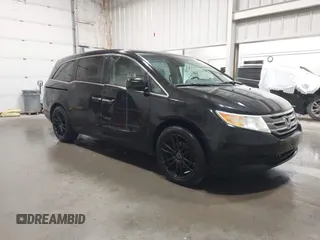 2011 Honda Odyssey EX-L with VIN 5FNRL5H60BB023741, listed as a IAAI auction lot 42327350 with 215,118 mi miles and . Bid and sale history available at DreamBid. Image 1.