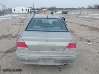 2002 Mitsubishi Lancer ES with VIN JA3AJ26E62U043039, listed as a IAAI auction lot 41600217 with 141,217 mi miles. Bid and sale history available at carsss.com. Image 16.