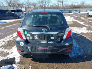2012 Toyota Yaris L with VIN JTDJTUD33CD520102, listed as a IAAI auction lot 41621530 with 133,144 mi miles. Bid and sale history available at carsss.com. Image 17.
