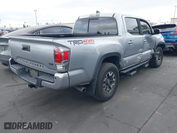 2020 Toyota Tacoma SR5 z VIN 3TMCZ5AN6LM288974, wystawiony jako IAAI lot #42185181 z przebiegiem 94 759 mil mil oraz . Historia ofert i sprzedaży dostępna na DreamBid. Obrazek 4.