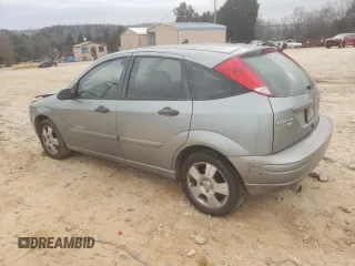 2006 Ford Focus S with VIN 1FAHP37N76W180039, listed as a Copart auction lot 58328565 with 220,696 mi miles and Salvage title. Bid and sale history available at DreamBid. Image 2.
