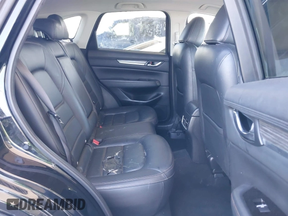 2020 Mazda CX-5 Grand Touring z VIN JM3KFADMXL0740144, wystawiony jako IAAI lot #41830203 z przebiegiem 70 535 mil mil oraz . Historia ofert i sprzedaży dostępna na DreamBid. Obrazek 8.