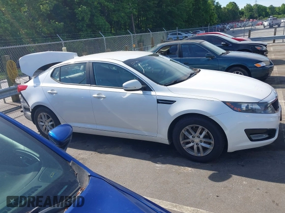 2013 Kia Optima LX z VIN KNAGM4A7XD5374109, wystawiony jako IAAI lot #42209534 z przebiegiem 184 578 mil mil oraz . Historia ofert i sprzedaży dostępna na DreamBid. Obrazek 13.