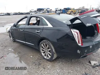 2016 Cadillac XTS Luxury Collection with VIN 2G61N5S33G9140637, listed as a IAAI auction lot 41067574 with Not Provided miles and . Bid and sale history available at DreamBid. Image 3.