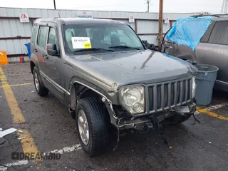 2012 Jeep Liberty Sport with VIN 1C4PJLAK8CW165745, listed as a IAAI auction lot 41565601 with 144,860 mi miles and . Bid and sale history available at DreamBid. Image 1.