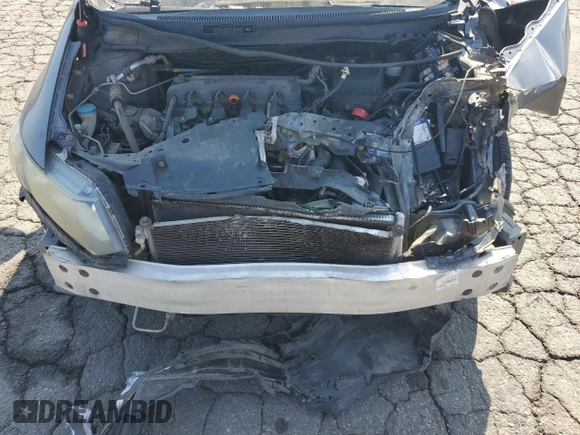 2013 Honda Civic LX z VIN 19XFB2F51DE275750, wystawiony jako Copart lot #59807025 z przebiegiem 134 691 mil mil oraz Szkoda całkowita • Salvage title. Historia ofert i sprzedaży dostępna na DreamBid. Obrazek 11.