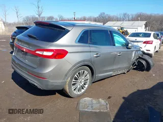 2016 Lincoln MKX Reserve with VIN 2LMTJ6LR7GBL90370, listed as a IAAI auction lot 41578776 with Not Provided miles and . Bid and sale history available at DreamBid. Image 4.