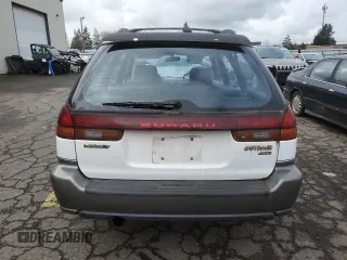 1996 Subaru Legacy Outback with VIN 4S3BG6850T7971454, listed as a Copart auction lot 52082395 with 173,542 mi miles and Salvage title. Bid and sale history available at DreamBid. Image 6.