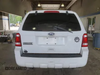 2010 Ford Escape XLS with VIN 1FMCU9C75AKD02318, listed as a Copart auction lot 59130055 with Not provided miles and Salvage title. Bid and sale history available at DreamBid. Image 6.