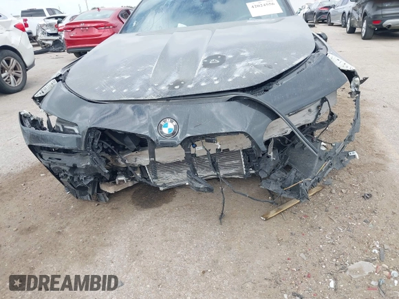 2023 BMW 7 Series 740i with VIN WBA23EH05PCM58771, listed as a IAAI auction lot 42024556 with Not provided miles and . Bid and sale history available at DreamBid. Image 6.