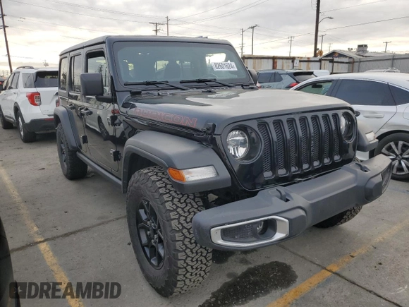 2022 Jeep Wrangler Unlimited High Tide with VIN 1C4HJXDG4NW179888, listed as a Copart auction lot 82601624 with 15,631 mi miles and Salvage Title. Bid and sale history available at DreamBid. Image 4.