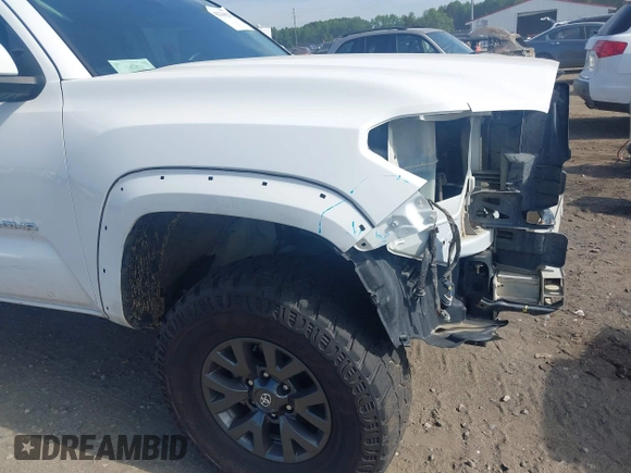 2023 Toyota Tacoma SR with VIN 3TYCZ5AN2PT112854, listed as a IAAI auction lot 42220025 with 43,657 mi miles and . Bid and sale history available at DreamBid. Image 18.