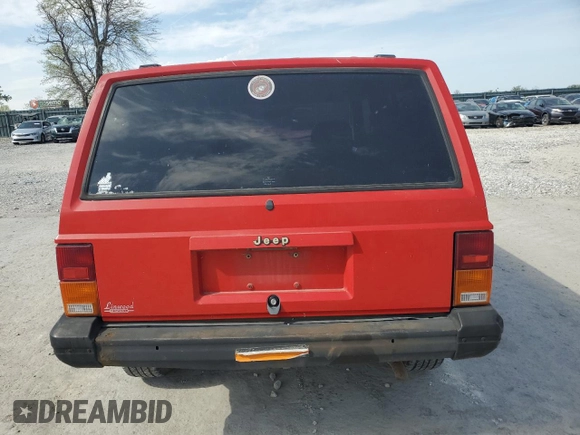 1995 Jeep Cherokee SE with VIN 1J4FT27P9SL561969, listed as a Copart auction lot 53295865 with 151,377 mi miles and Salvage title. Bid and sale history available at DreamBid. Image 6.