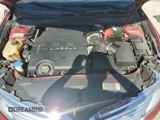 2013 Lincoln MKZ z VIN 3LN6L2GK3DR817386, wystawiony jako Copart lot #55602535 z przebiegiem 121 664 mil mil oraz Szkoda całkowita • Salvage title. Historia ofert i sprzedaży dostępna na DreamBid. Obrazek 11.