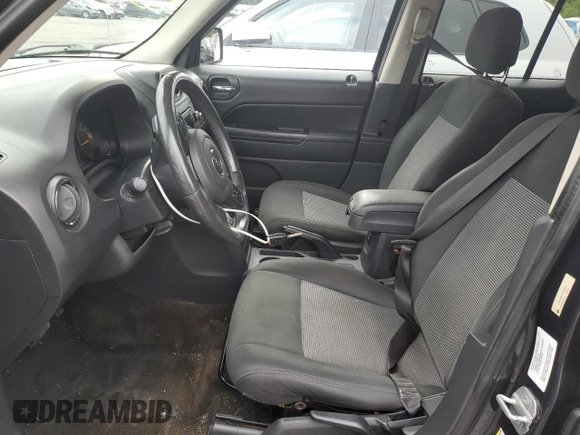 2014 Jeep Patriot Latitude with VIN 1C4NJRFB4ED588422, listed as a Copart auction lot 61401025 with 162,855 mi miles and Salvage title. Bid and sale history available at DreamBid. Image 7.