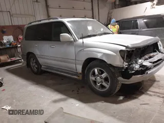 2007 Toyota Land Cruiser z VIN JTEHT05J972108283, wystawiony jako IAAI lot #41476536 z przebiegiem 212 693 mil mil oraz . Historia ofert i sprzedaży dostępna na DreamBid. Obrazek 1.