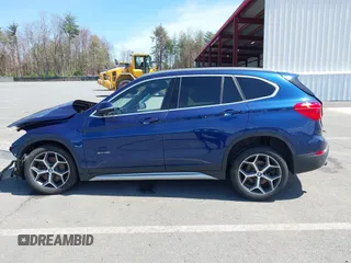 2017 BMW X1 xDrive28i with VIN WBXHT3C39H5F71525, listed as a IAAI auction lot 42050272 with 118,875 mi miles. Bid and sale history available at carsss.com. Image 13.