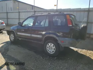 1999 Honda CR-V LX with VIN JHLRD2847XC021888, listed as a Copart auction lot 76556164 with 285,517 mi miles and Salvage Title. Bid and sale history available at carsss.com. Image 2.