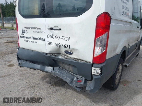2015 Ford Transit Cargo with VIN 1FTNR1ZM6FKA34609, listed as a IAAI auction lot 42635875 with 214,750 mi miles and . Bid and sale history available at DreamBid. Image 6.