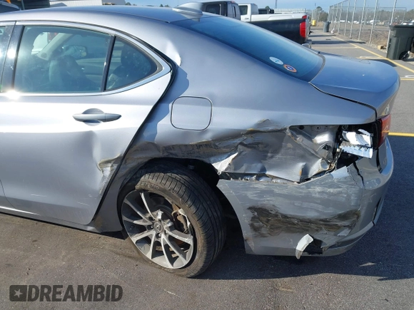 2015 Acura TLX V6 Tech with VIN 19UUB2F51FA017999, listed as a IAAI auction lot 41451757 with 123,619 mi miles. Bid and sale history available at carsss.com. Image 6.