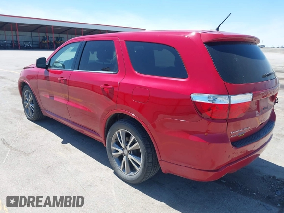 2013 Dodge Durango R/T with VIN 1C4SDJCTXDC697240, listed as a IAAI auction lot 42209558 with 130,735 mi miles and . Bid and sale history available at DreamBid. Image 3.
