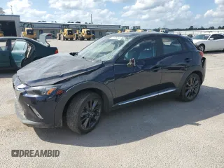 2018 Mazda CX-3 Grand Touring z VIN JM1DKFD79J0329416, wystawiony jako Copart lot #51708325 z przebiegiem 64 597 mil mil oraz Szkody całkowita. Historia ofert i sprzedaży dostępna na DreamBid. Obrazek 1.