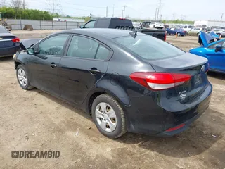 2018 Kia Forte LX with VIN 3KPFK4A77JE189410, listed as a IAAI auction lot 42070033 with 97,698 mi miles. Bid and sale history available at carsss.com. Image 3.