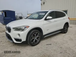 2016 BMW X1 xDrive28i z VIN WBXHT3Z38G4A51909, wystawiony jako Copart lot #47851295 z przebiegiem 101 812 mil mil oraz Czysty tytuł • Clean title. Historia ofert i sprzedaży dostępna na DreamBid. Obrazek 1.