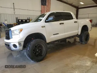 2013 Toyota Tundra Limited z VIN 5TFFY5F12DX142041, wystawiony jako Copart lot #76142964 z przebiegiem 147 008 mil mil oraz Czysty tytuł • Clean title. Historia ofert i sprzedaży dostępna na DreamBid. Obrazek 1.